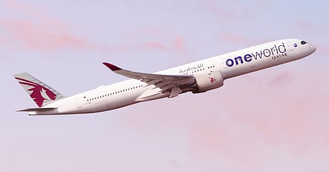 A Qatar Airways plane with oneworld branding