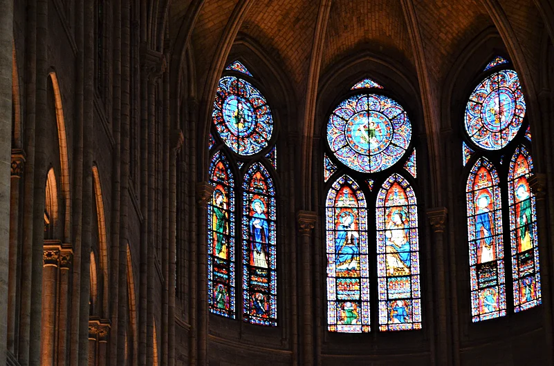 A section of the stained-glass windows have been restored