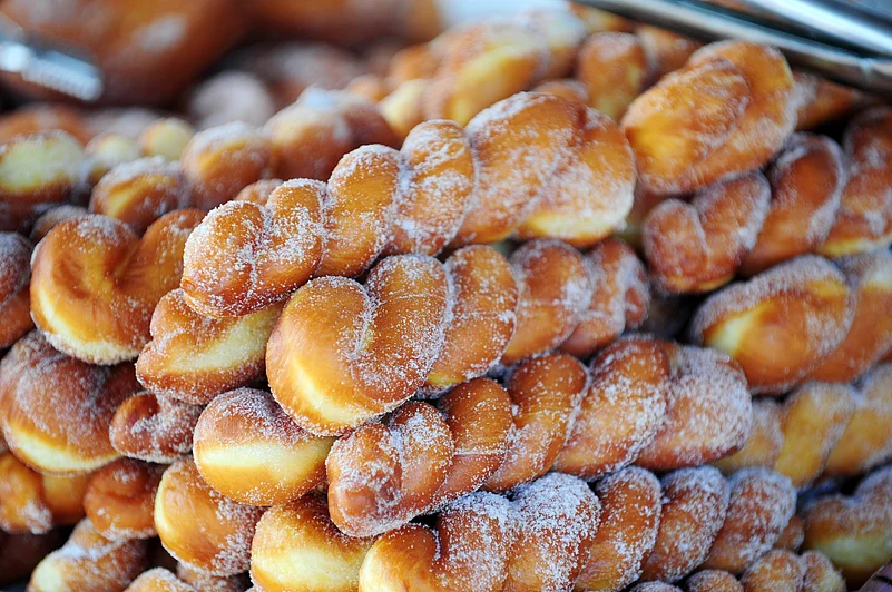 Indulge in lip-smacking local delicacies like Kkwabaegi or twisted doughnuts