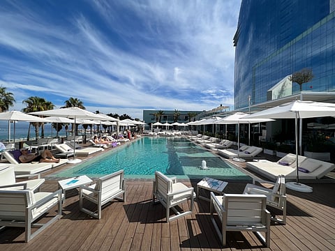 Hotels stand to benefit the most from the closure of holiday apartments. Pictured here is the swimming pool of the W Barcelona