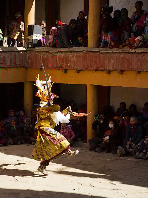 A person performs a traditional dance in Korzok