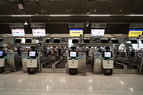 Conventional self-service baggage drop-off units enable travellers to bypass check-in desks. Pictured here is Suvarnabhumi Airport 