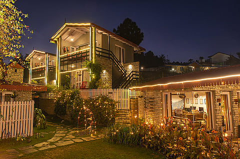 The Birdcage lit up at night