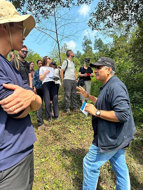 Sanjeev Bhuchar (right) explaining the spring revival process to members of the United Kingdom's Foreign, Commonwealth and Development Office