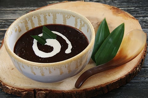 Pulut Hitam combines black glutinous rice, simmered until tender and creamy