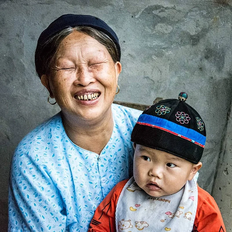 A Nùng woman and child