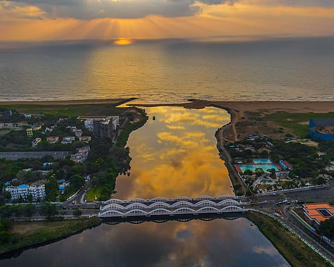 An aerial view of the bridge at sunset
