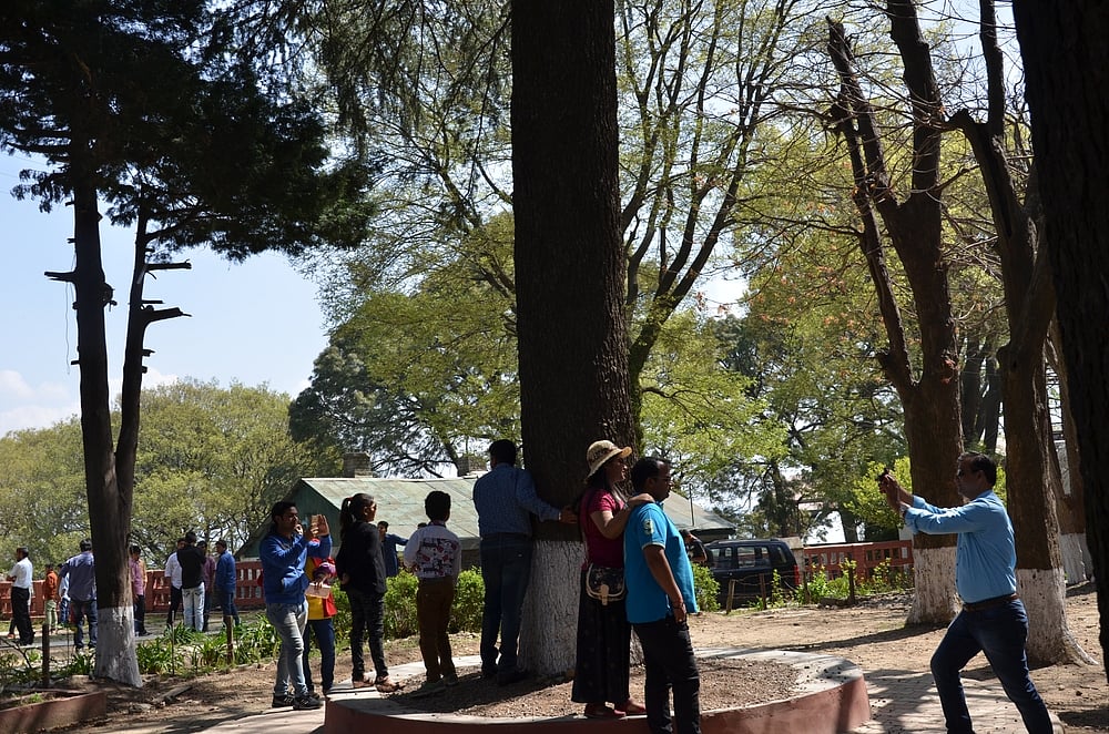 Tourists around the historic Christ Church in Kasauli