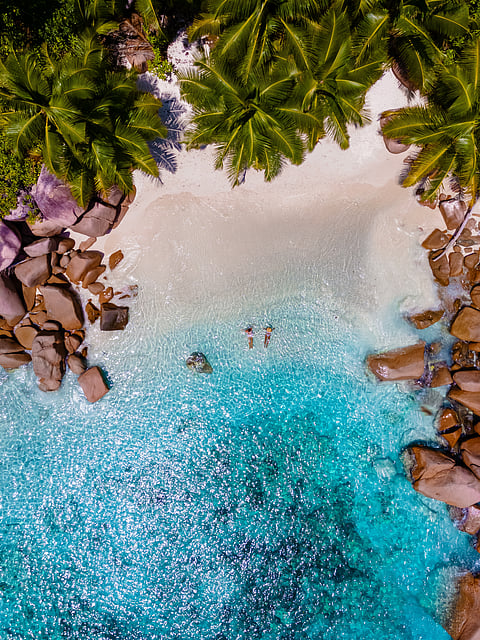 Seychelles' crystal-clear waters and unspoiled beaches