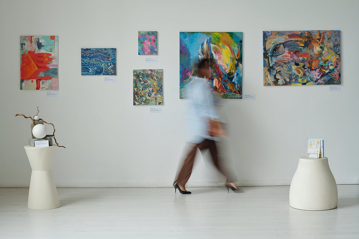A woman at an art exhibition