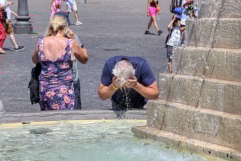 Wash hands, face and wrists with cool water as often as possible in public fountains