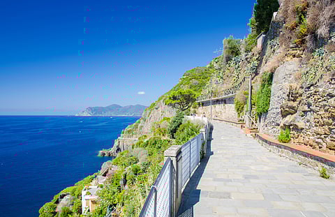 The Via dell’Amore is a well-known tourist destination in Cinque Terre that spans a paved, flat walking path