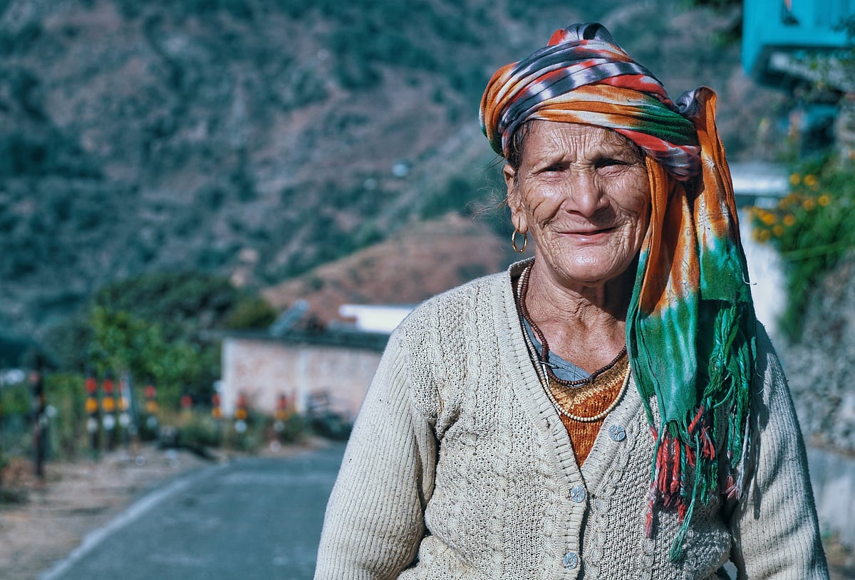 A mountain resident of Uttarakhand smiles for the camera