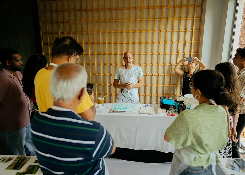 Burns addressing a group of people at The Westin Goa