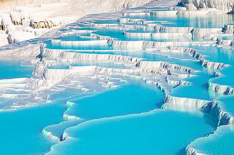 Check out the turquoise travertines of Pamukkale