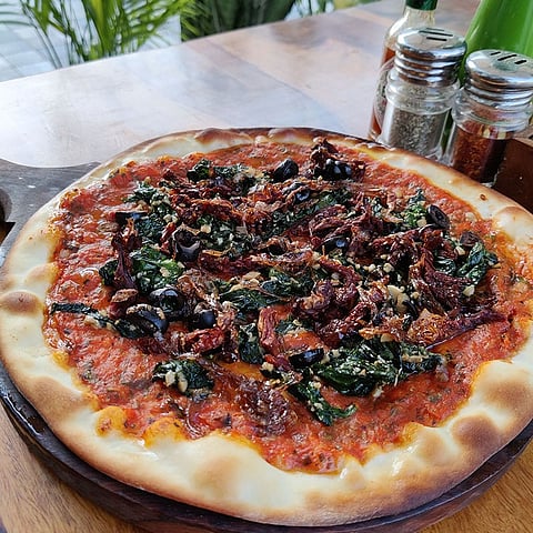 / A pizza at Roy's Pizzeria