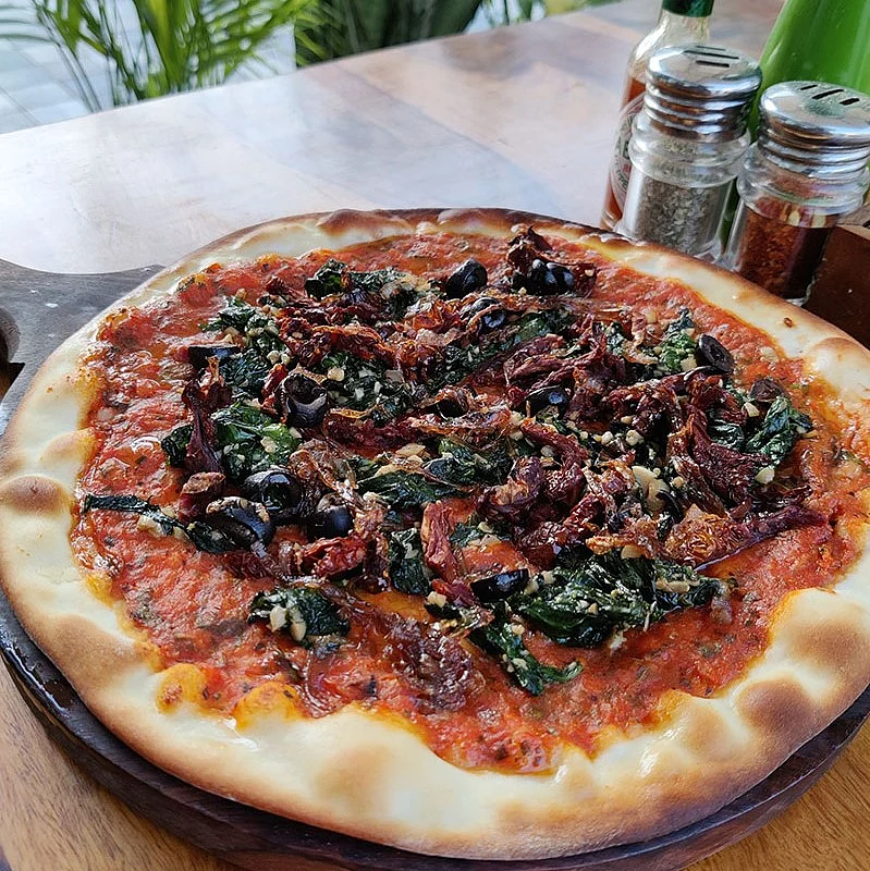 / A pizza at Roys Pizzeria