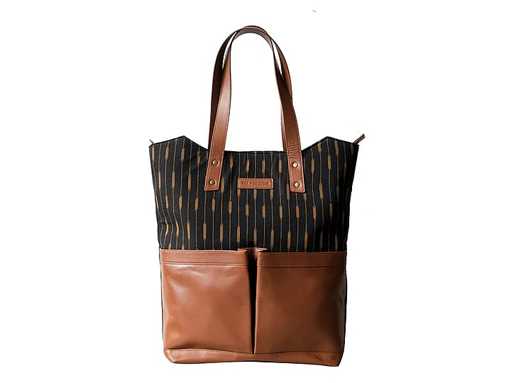 The Rosa Tote is a classic everyday work tote with functional zipper pockets