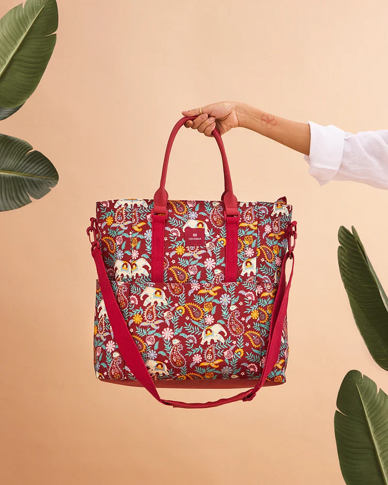 The “Paisley Tucker” travel tote is large with multiple pockets for quick access to phones, keys, wallets, earbuds and other handy essentials