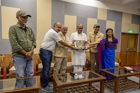 From left to right: Subbiah Nallamuthu, Manish Kalani, Ravi Singh, Digvijaya Singh, Jai Dhar Gupta and Raina Parmar unveil Kalani's coffee table book