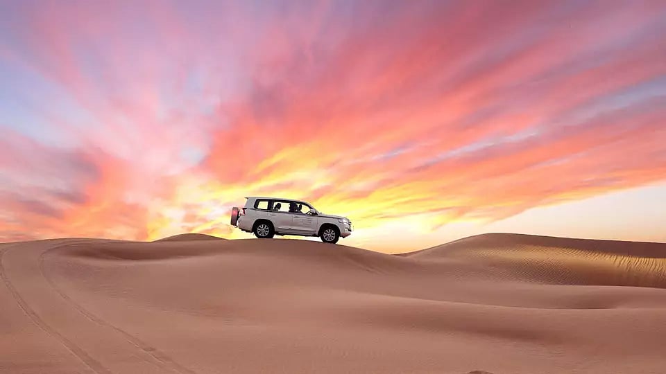 Indulge in a desert safari through the Empty Quarter, the largest uninterrupted sand mass in the world