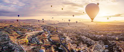 Hot air balloons at sunrise over Cappadocia 