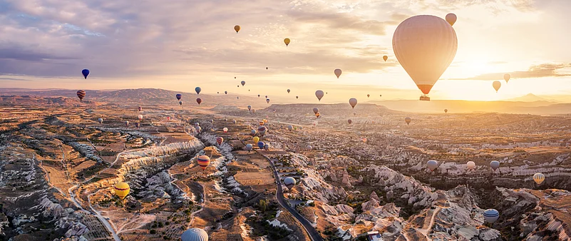 Hot air balloons at sunrise over Cappadocia