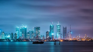 Aanimesh/Shutterstock : A portion of the Mumbai skyline at night