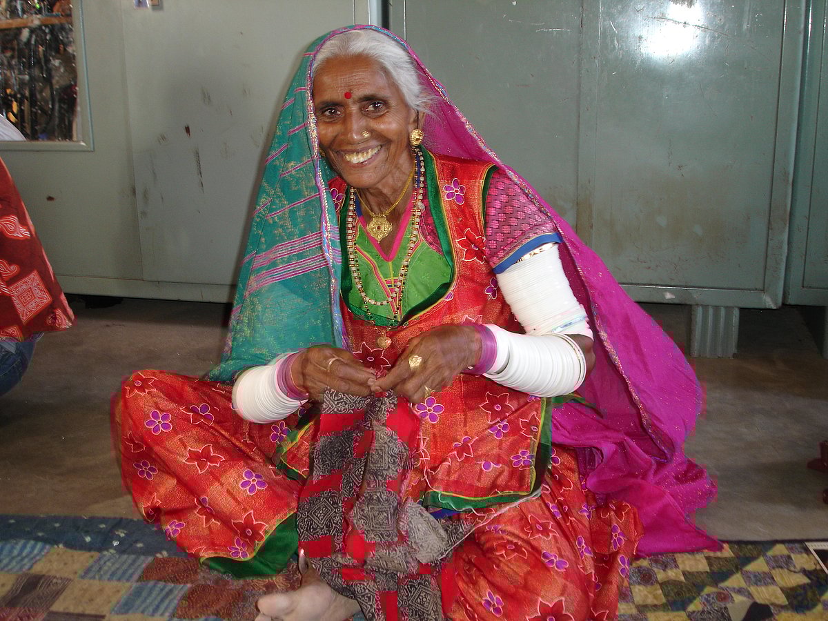 Copyright: Kala Raksha Trust : A Kala Raksha-affiliated artisan crafts a fabric board game