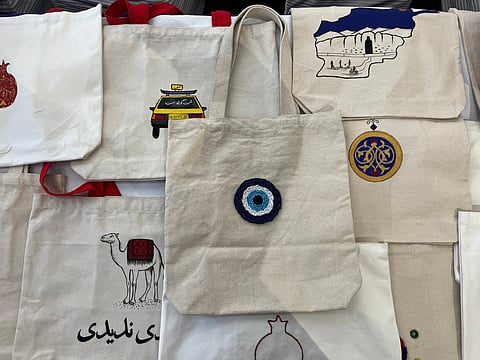 Maryam Kakar does the design and painting while Heela Kakar does the miniature art on the tote bags and notebooks