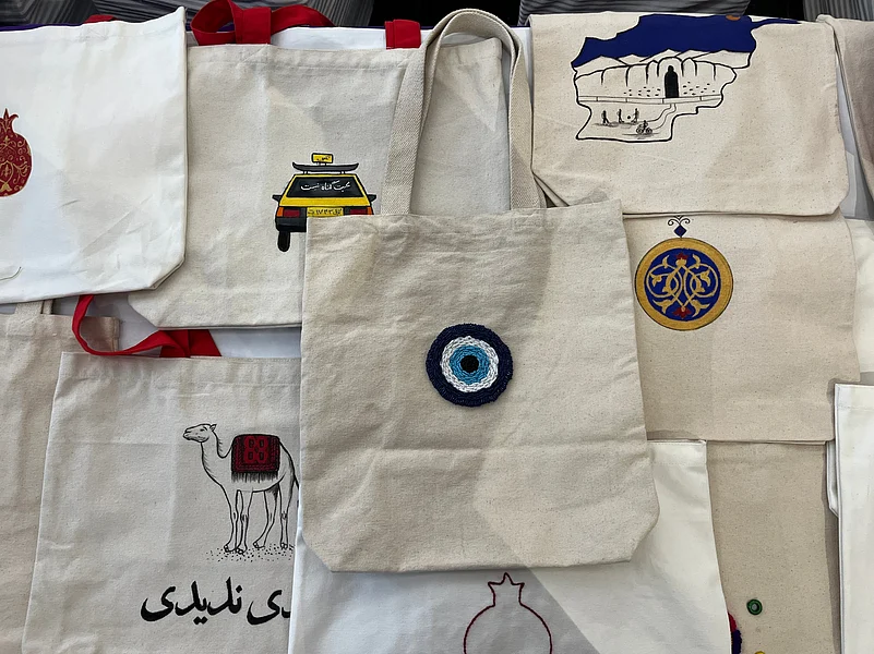 Maryam Kakar does the design and painting while Heela Kakar does the miniature art on the tote bags and notebooks