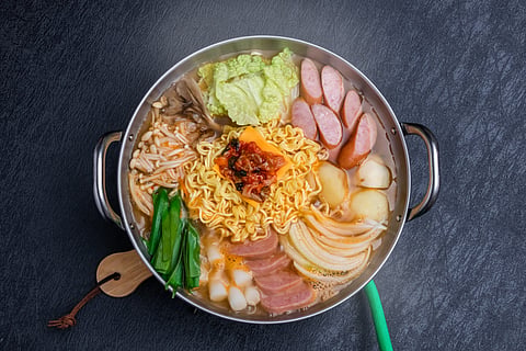 The origins of this dish trace back to the 1950s, in the aftermath of the Korean War