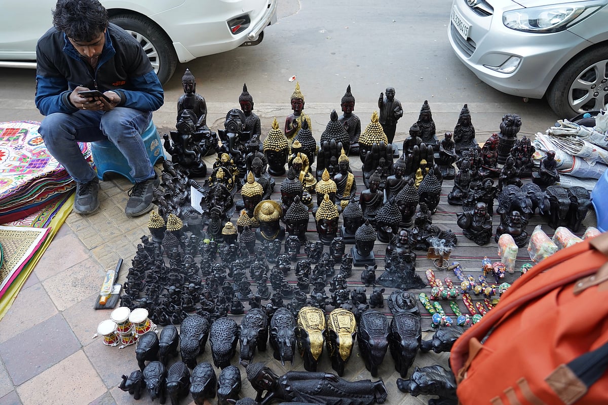 The Tibetan area of Janpath Market sells silver jewellery, statues of the Buddha, colourful beads, wooden artefacts and thangka paintings