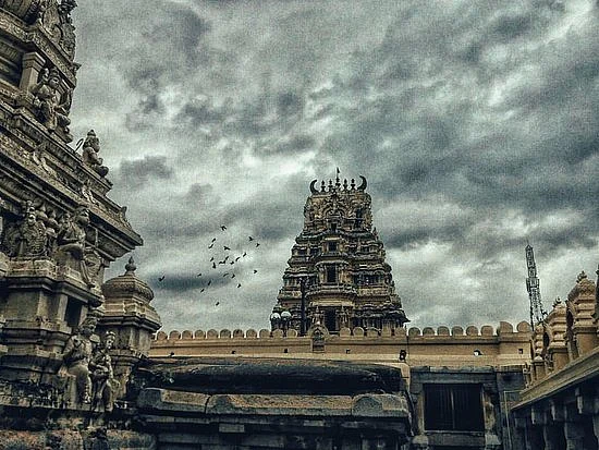 Constructed by the Cholas in the 11th century, the temple dazzles with its traditional Dravidian architecture
