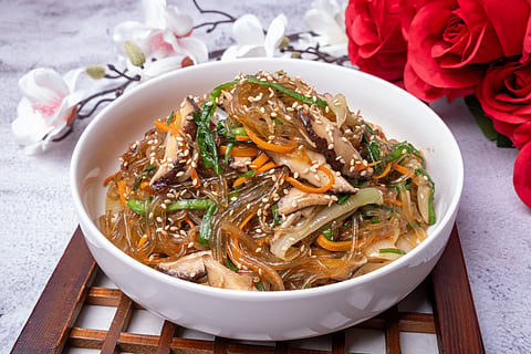 Japchae includes many colourful, thinly sliced veggies