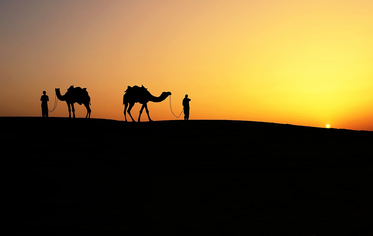 The dramatic landscape of the Khuri Sand Dunes at sunset