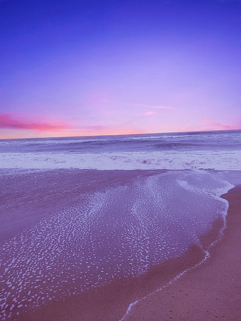 A purple glow descends on a Puri beach