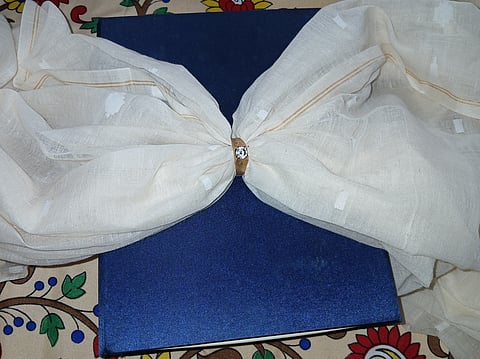 The fine Muslin sari of Bengal easily passes through a ring