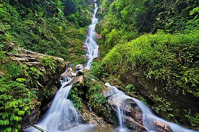 Kanchenjunga Falls is situated around an hours drive away from Pelling towards Yuksom