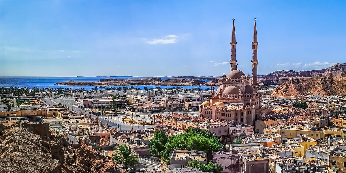 Wide angle drone panorama of Sharm El Sheikh coastline with Al Sahaba Mosque 