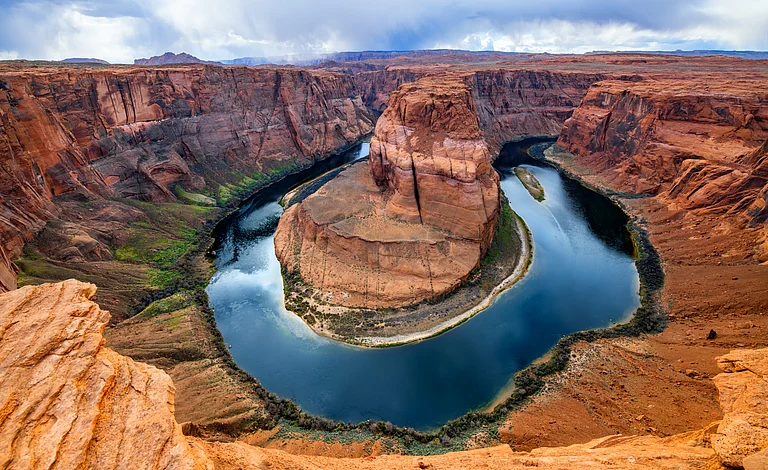 Horseshoe Bend is a horseshoe-shaped incised meander of Colorado River - Shutterstock