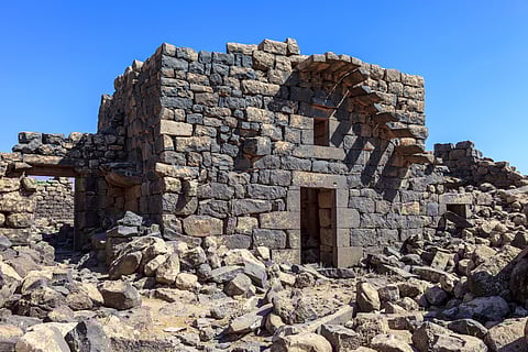 Ancient residents used the abundant black basalt from the region’s volcanic plain to construct sturdy, insulated structures