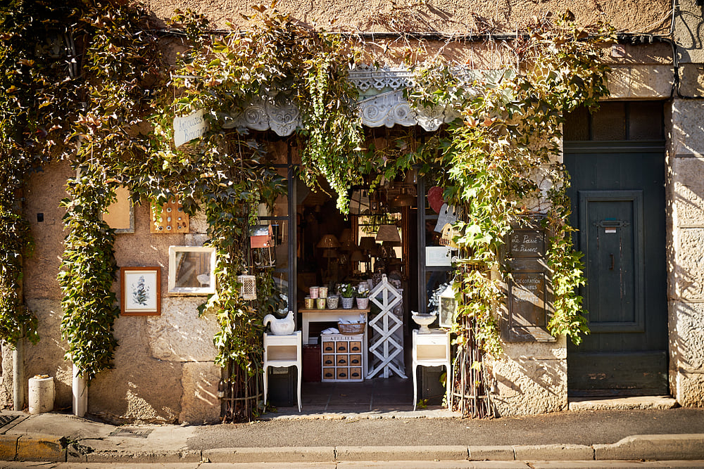 Explore the charm of roadside Provencal shops in Cotignac