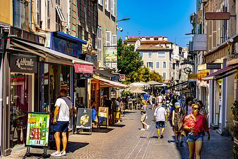 Rue de la Republique street in the historic old town quarter of Antibes 
