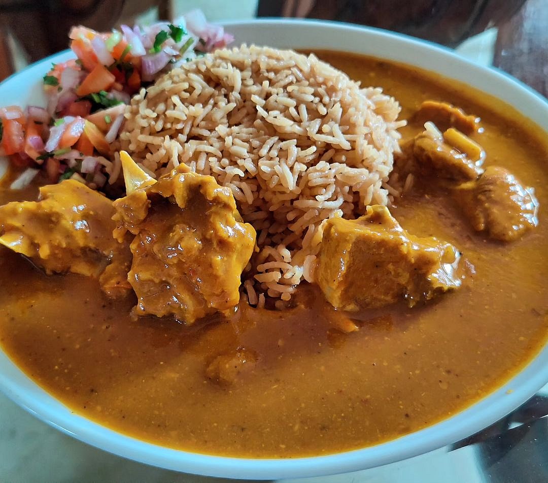 Mutton dhansaak with kachumber salad and rice