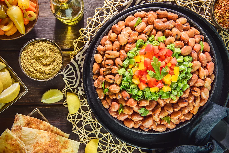 Ful medames is a stew of cooked fava beans served with olive oil and cumin