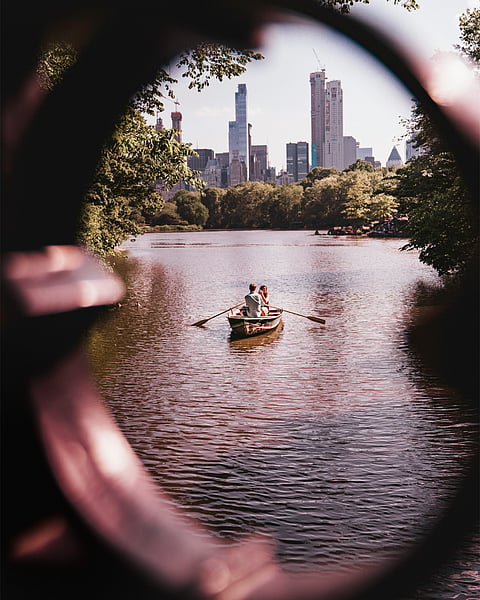 A couple boating inside Central Park