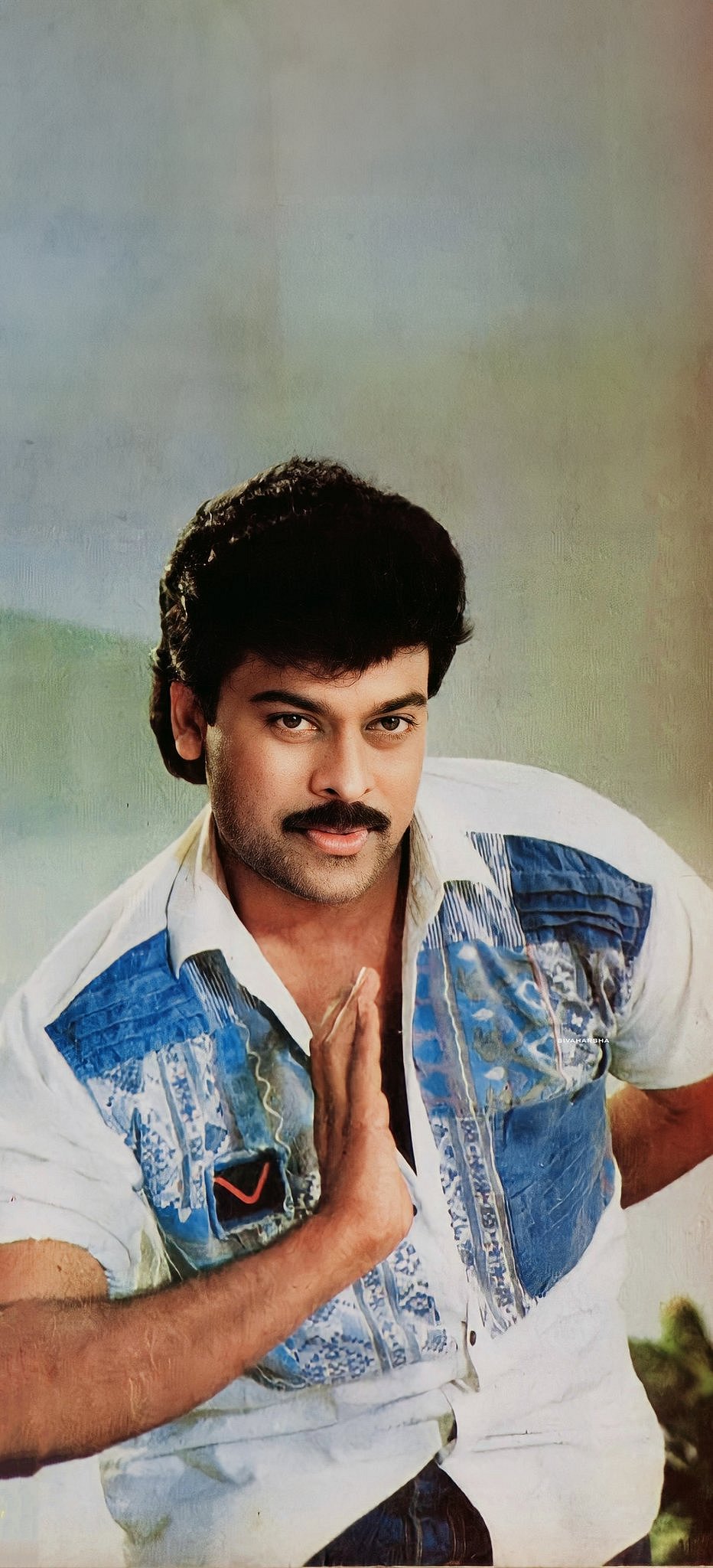 @SivaHarsha_23/x : Megastar Chiranjeevi posing for the camera in his youth