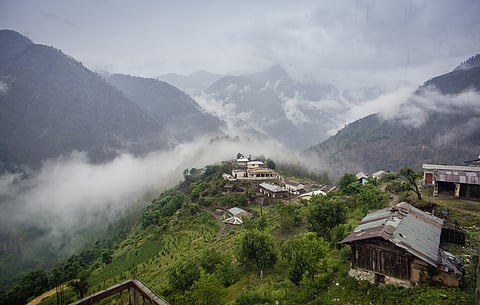 Fog swirls around Sankri village