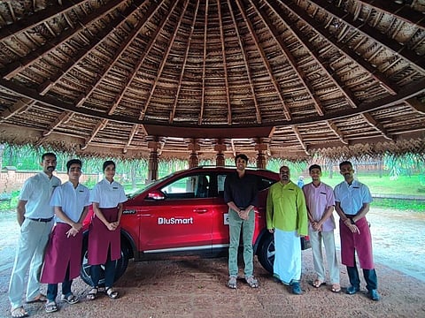 Sushil Reddy with the staff of a hotel in Gokarna, Karnataka